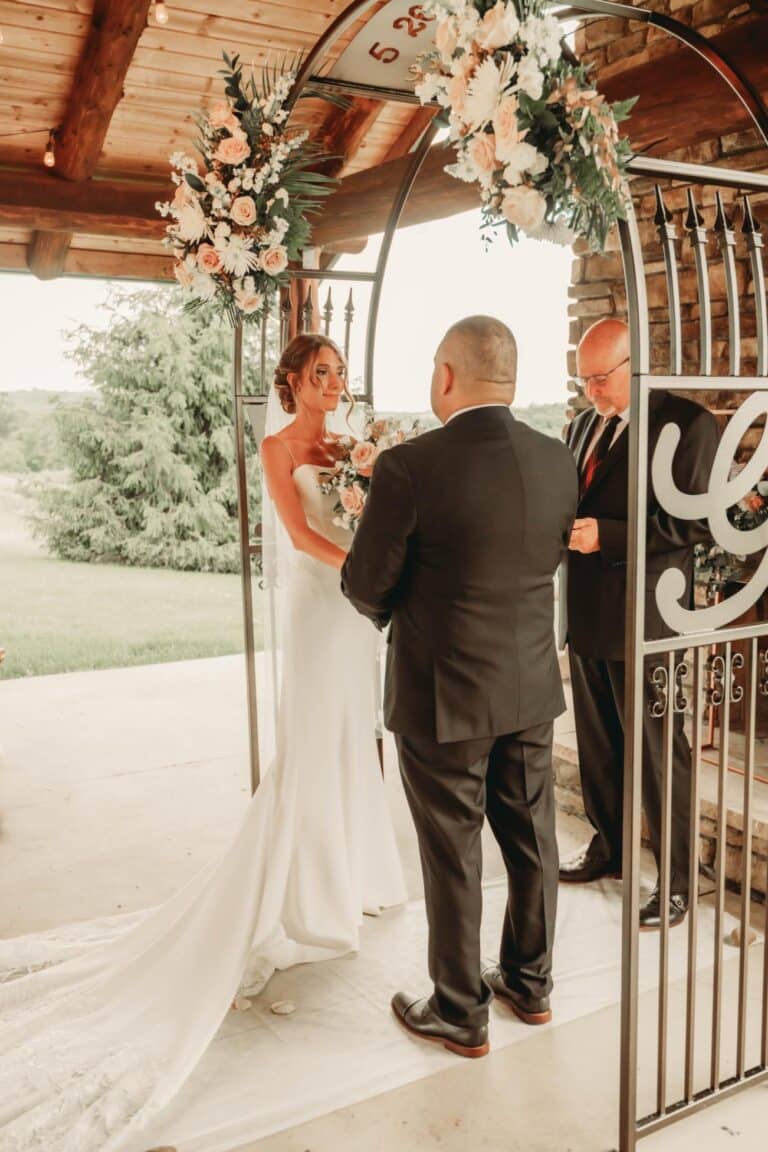 Bride and groom holding hands