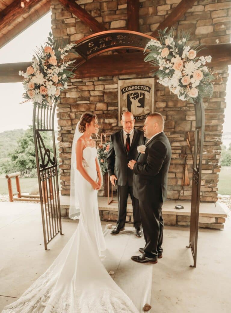 Bride and groom standing at altar