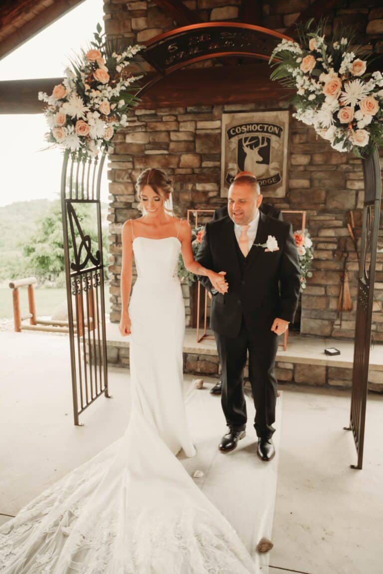 Bride and groom holding hands