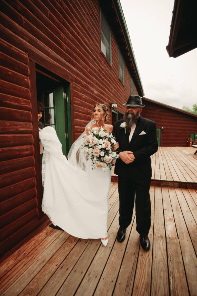 Bridge getting ready to walk down the aisle at her wedding