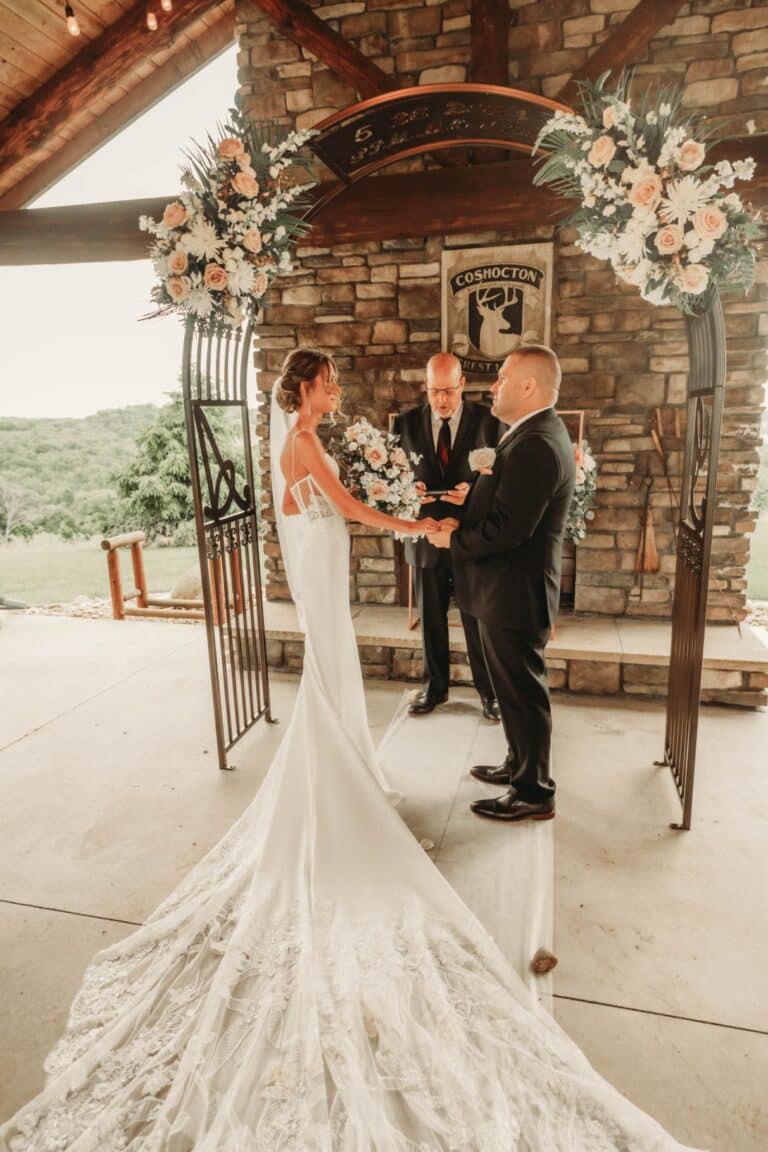 Bride and groom holding hands